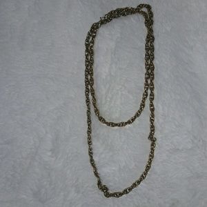 A gold  chained necklace